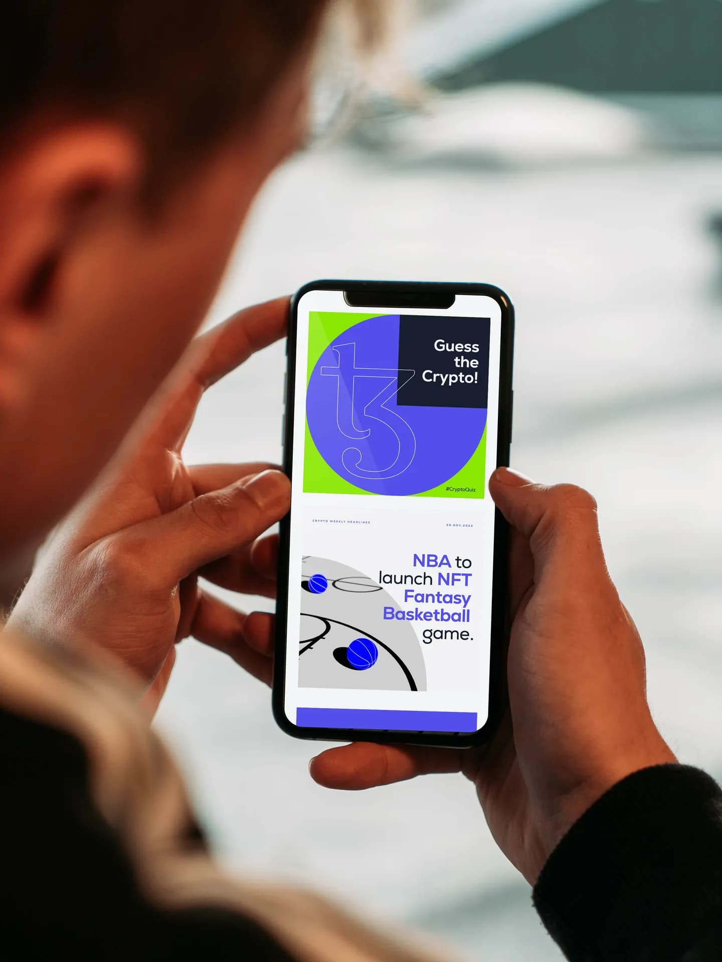 Hand holding a phone with the CoinSwitch app