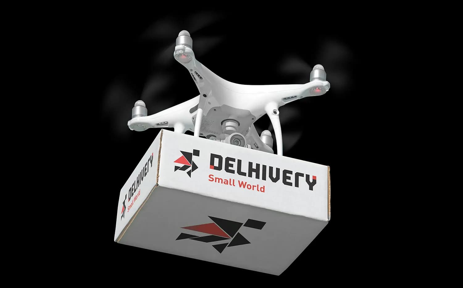 Drone carrying a Delhivery box