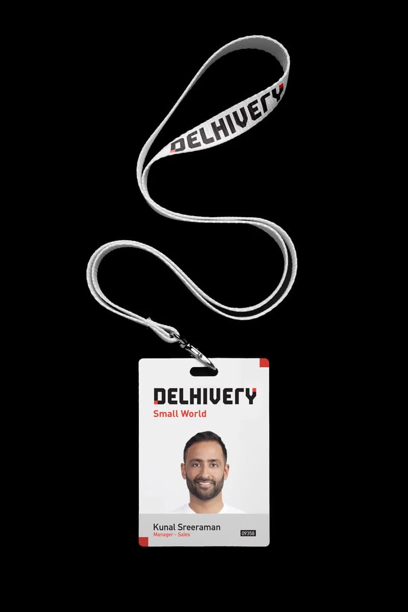 Delhivery employee ID badge on a lanyard