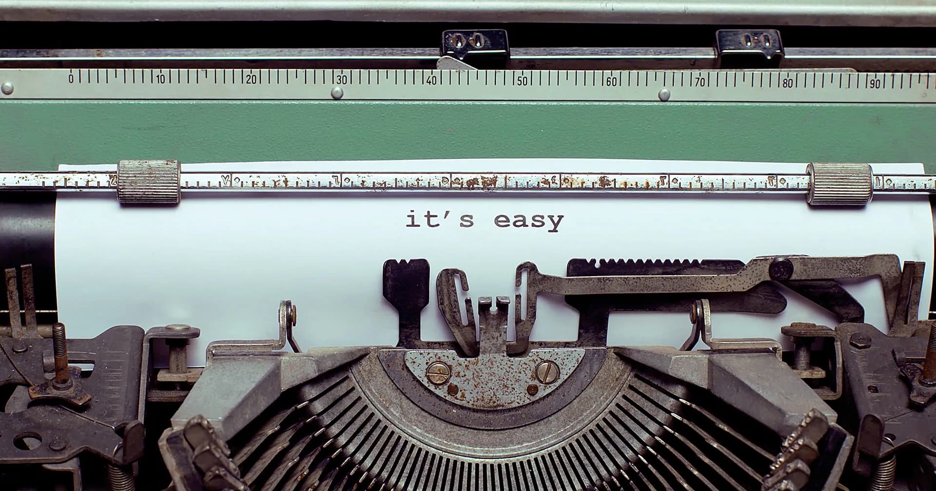 Typewriter close-up reading it’s easy, OnePlus campaign