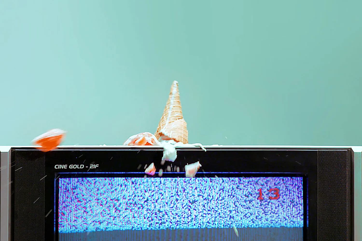 Ice cream cone melting on a static TV, OnePlus campaign
